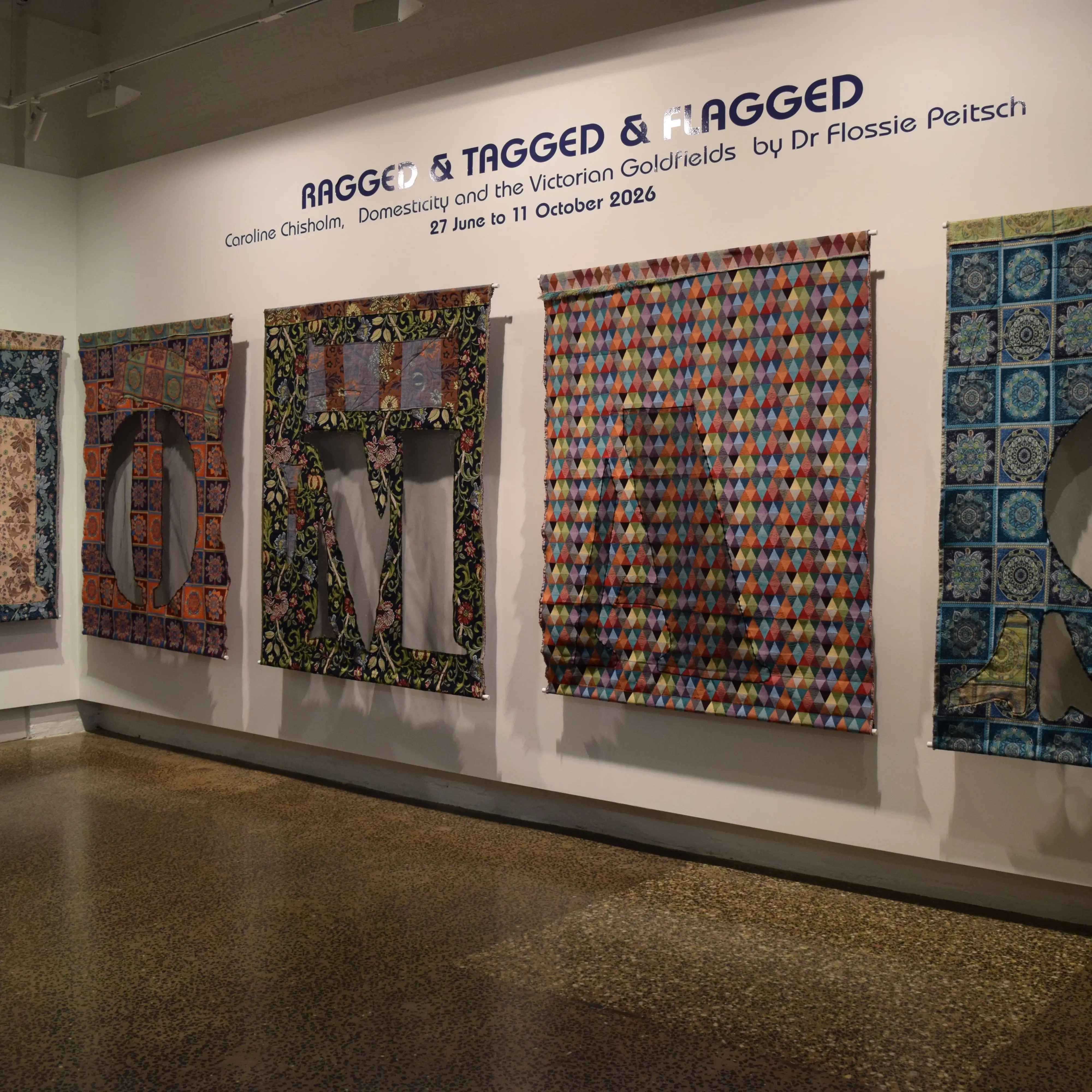 IMage of part of the exhibition installation for RAGGED & TAGGGED & FLAGGED by Dr Flossie Peitsch