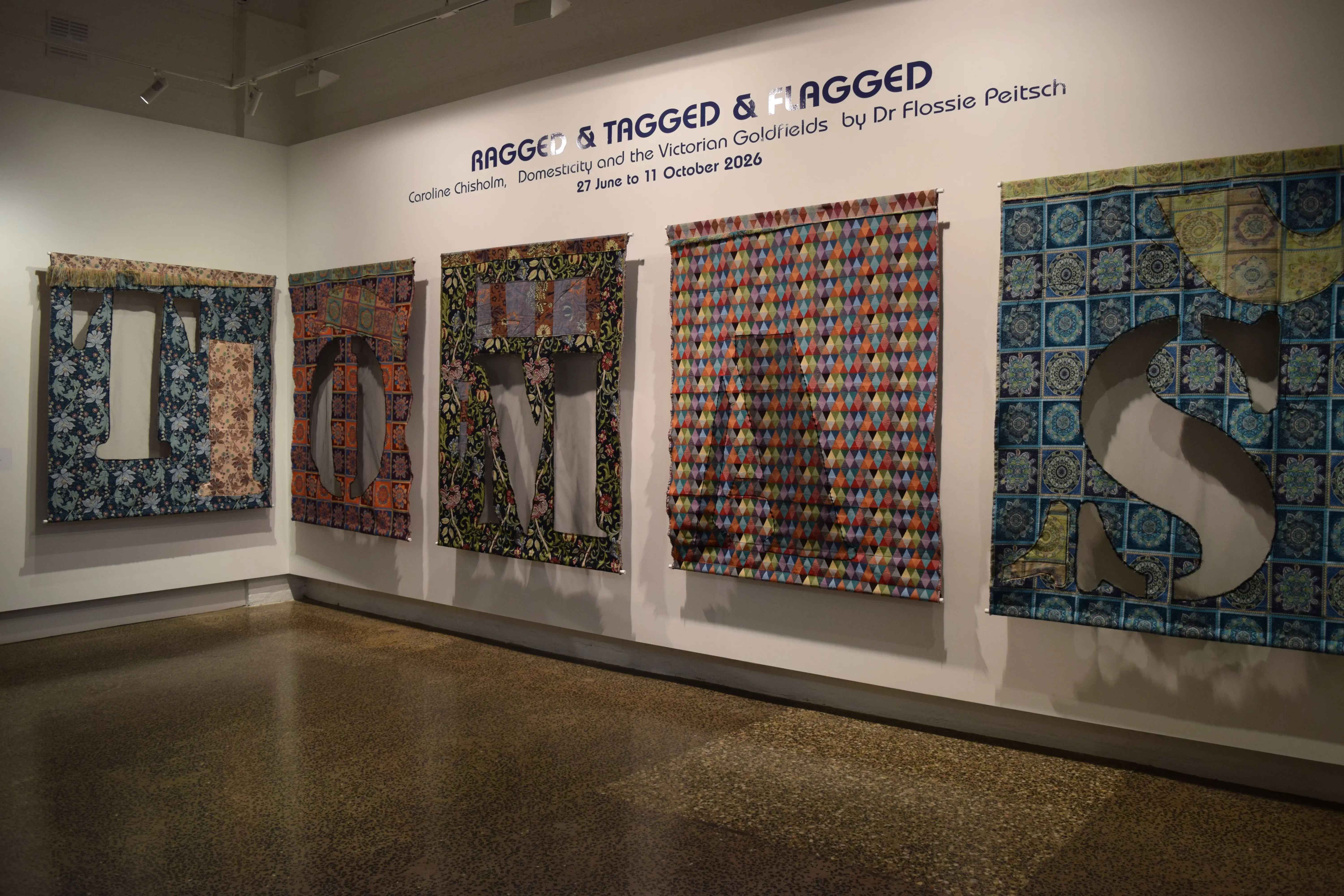 IMage of part of the exhibition installation for RAGGED & TAGGGED & FLAGGED by Dr Flossie Peitsch