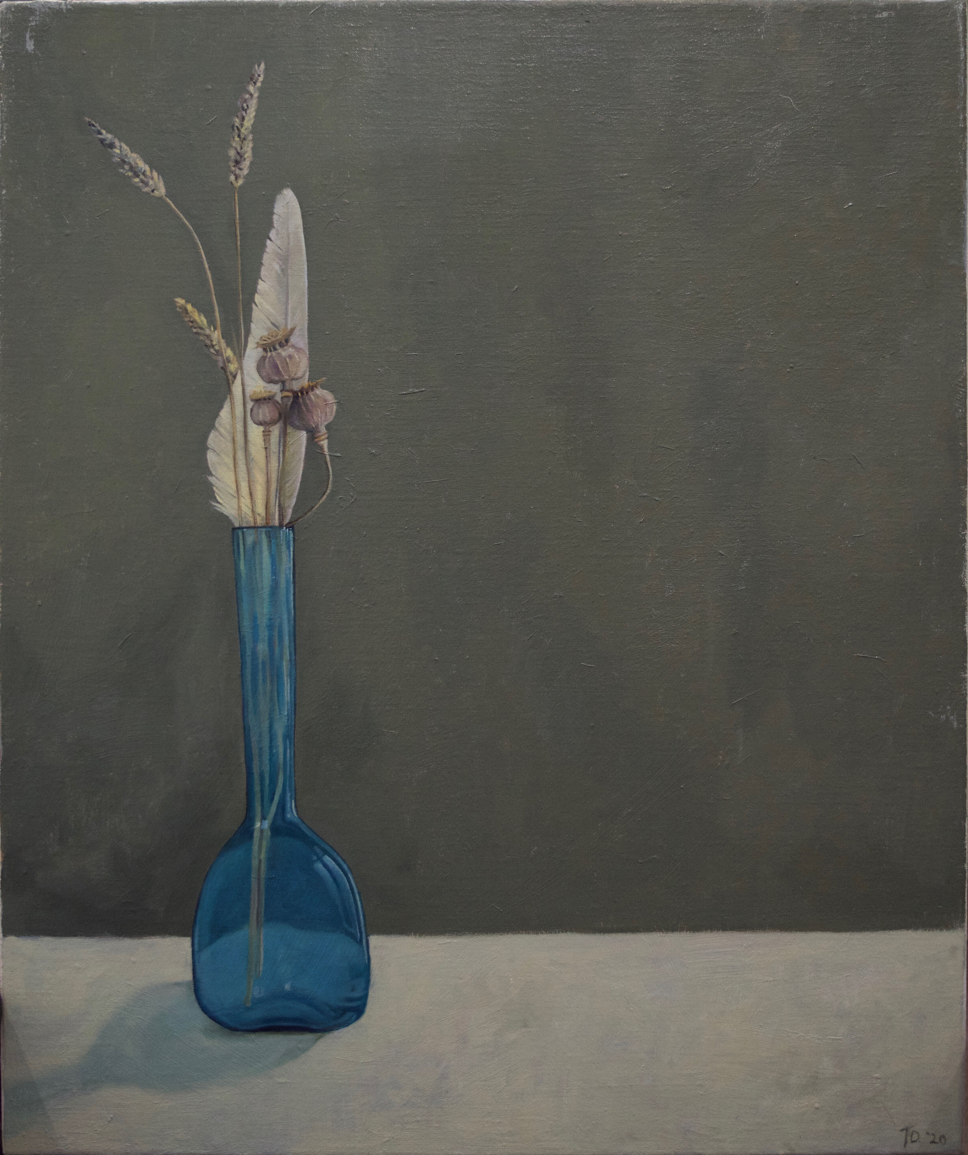 a painting by Tenar Dwyer titled SELF CONTAINED a realistic painting of a blue glass vase with a white feather and plant stems on a grey background