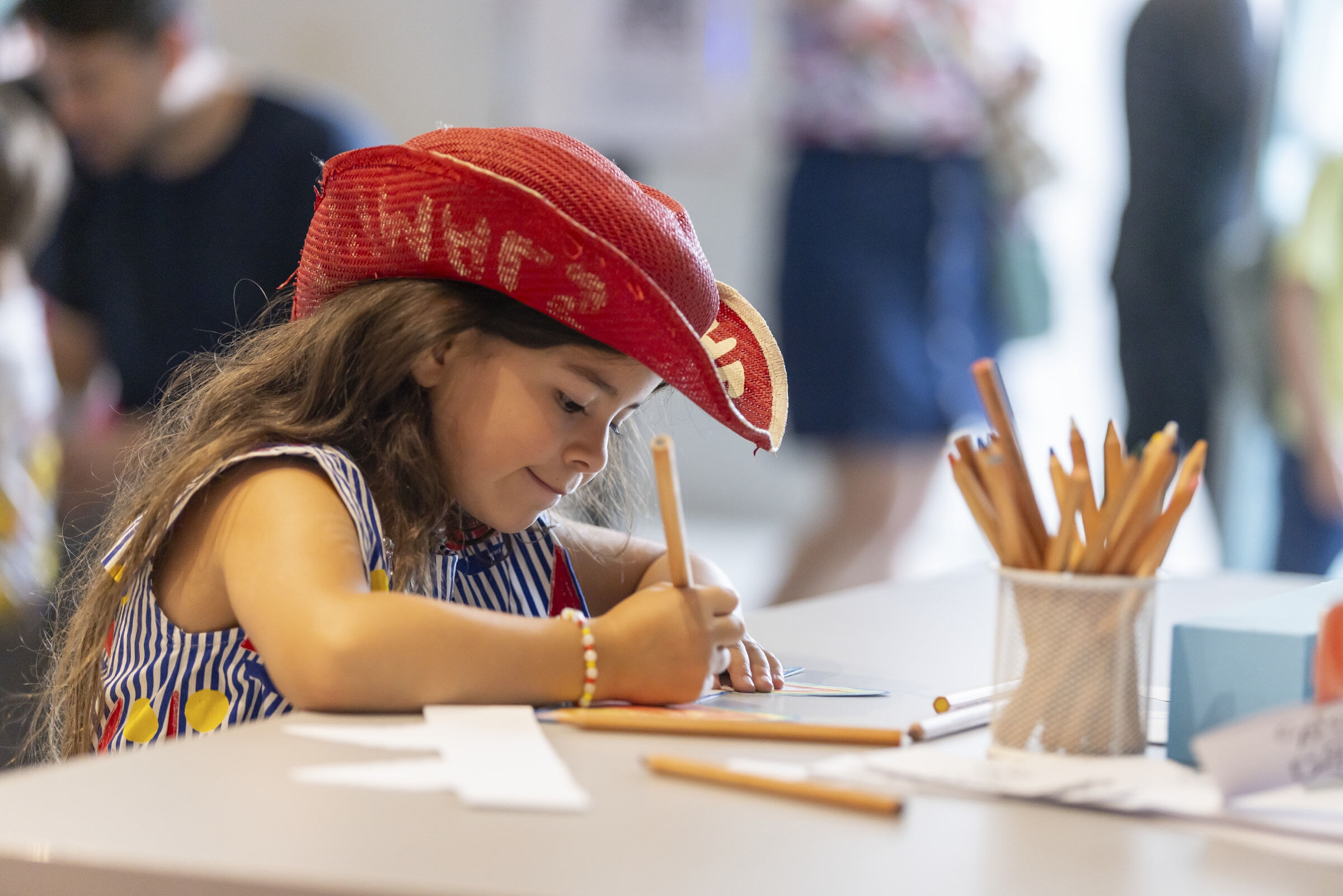 A child enjoying a creative workshop.  Photo_ Eugene Hyland