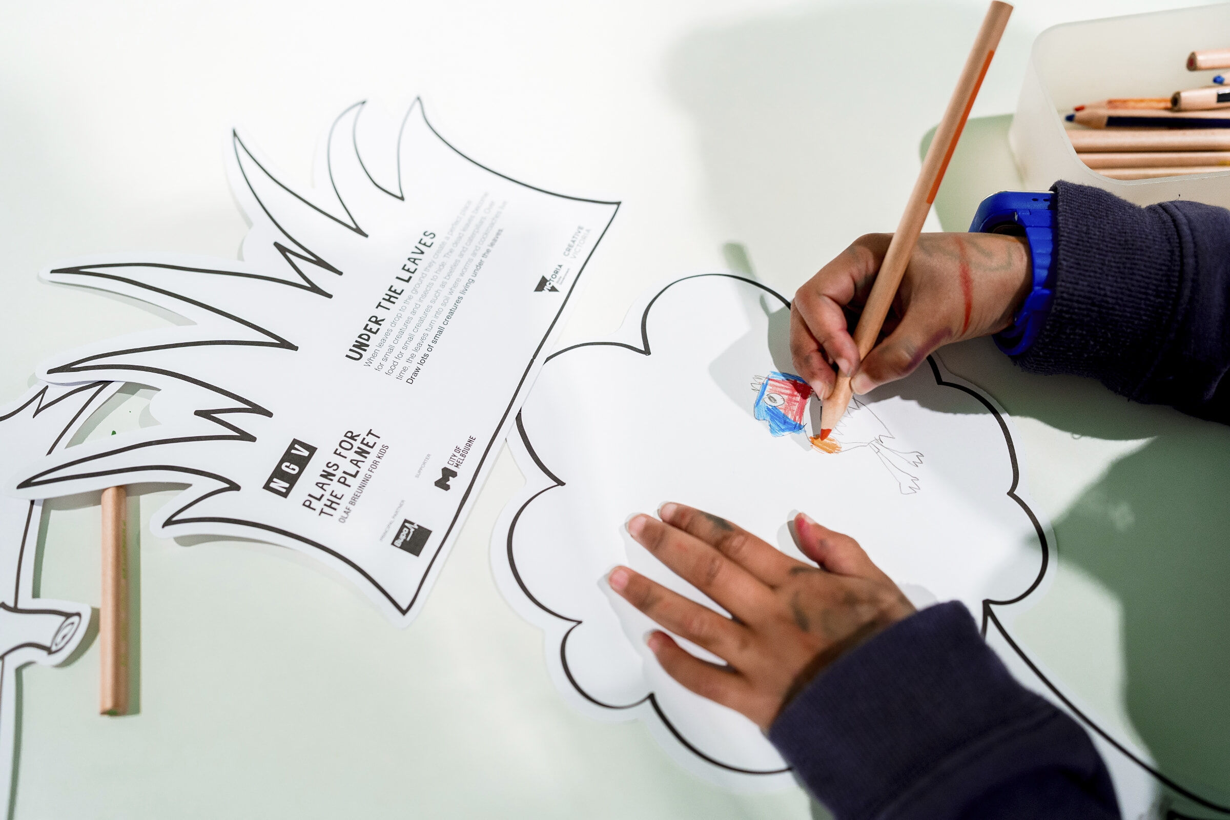 A child enjoying drawing. Photo_ Deshani Berhardt